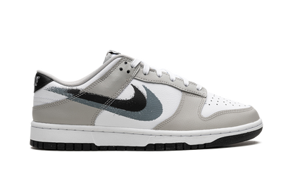 Dunk Low "Stencil Swoosh" FD0661 100